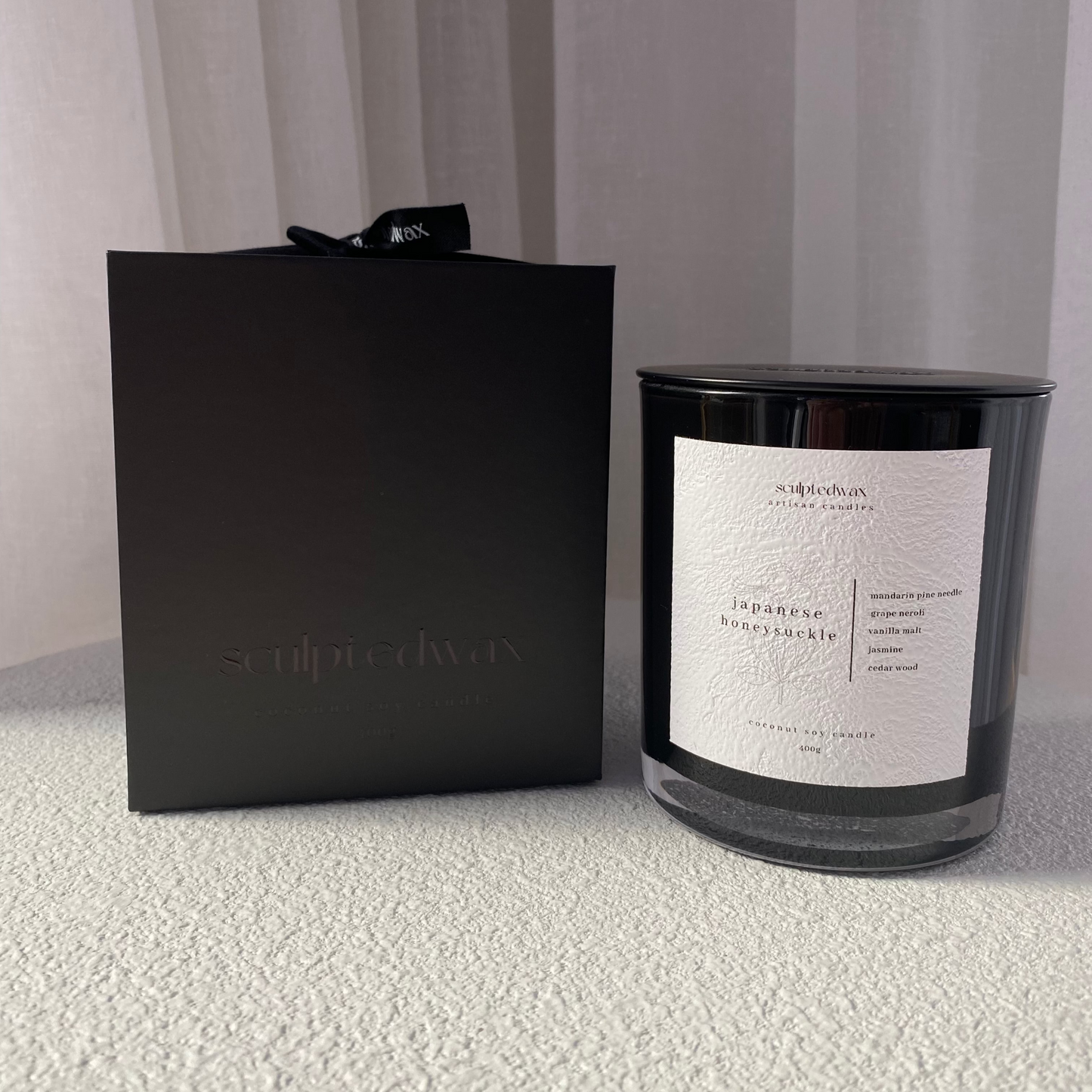 Japanese Honeysuckle candle in black jar