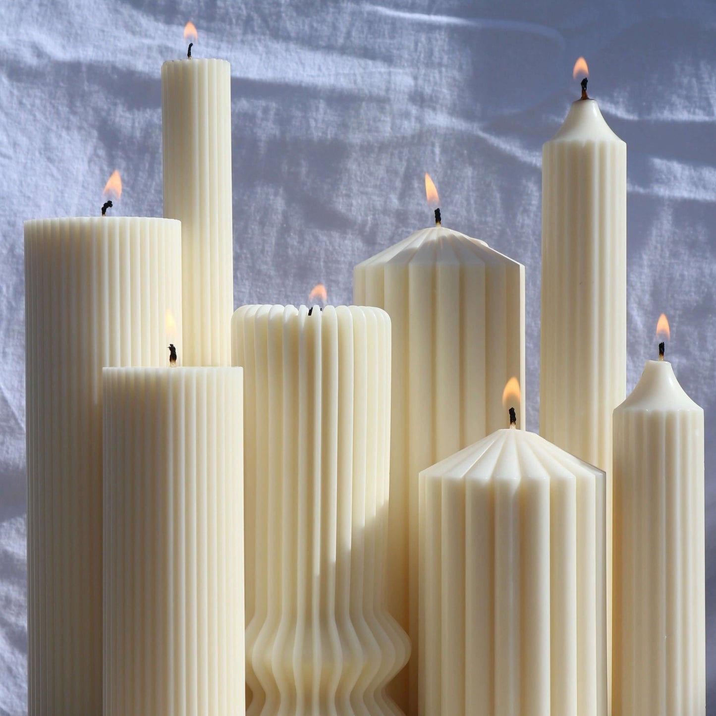 A Collection of Pillar Candles in an outdoor setting