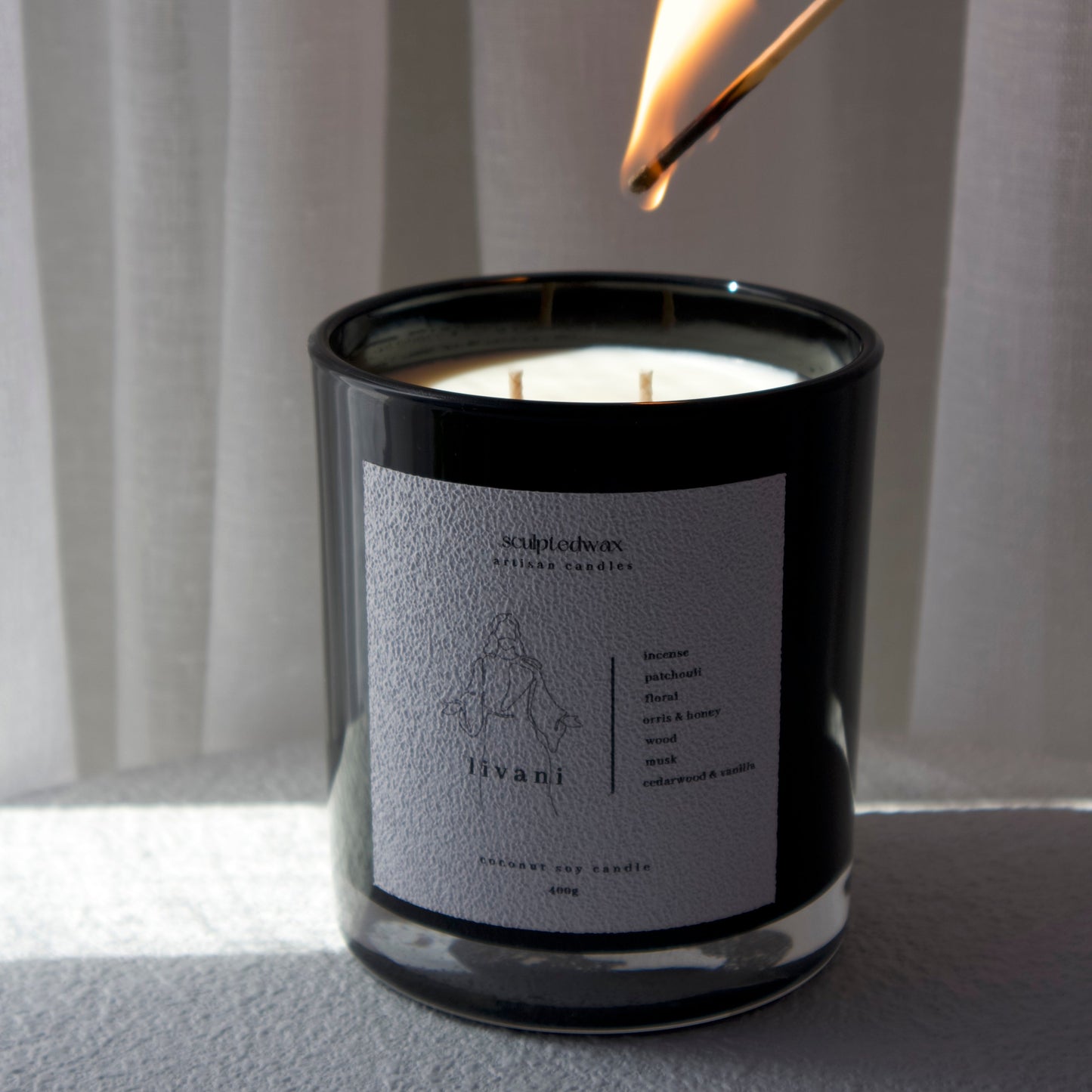 Close up of Livani limited edition coconut soy wax candle with cotton wick, luxury Vaso candle