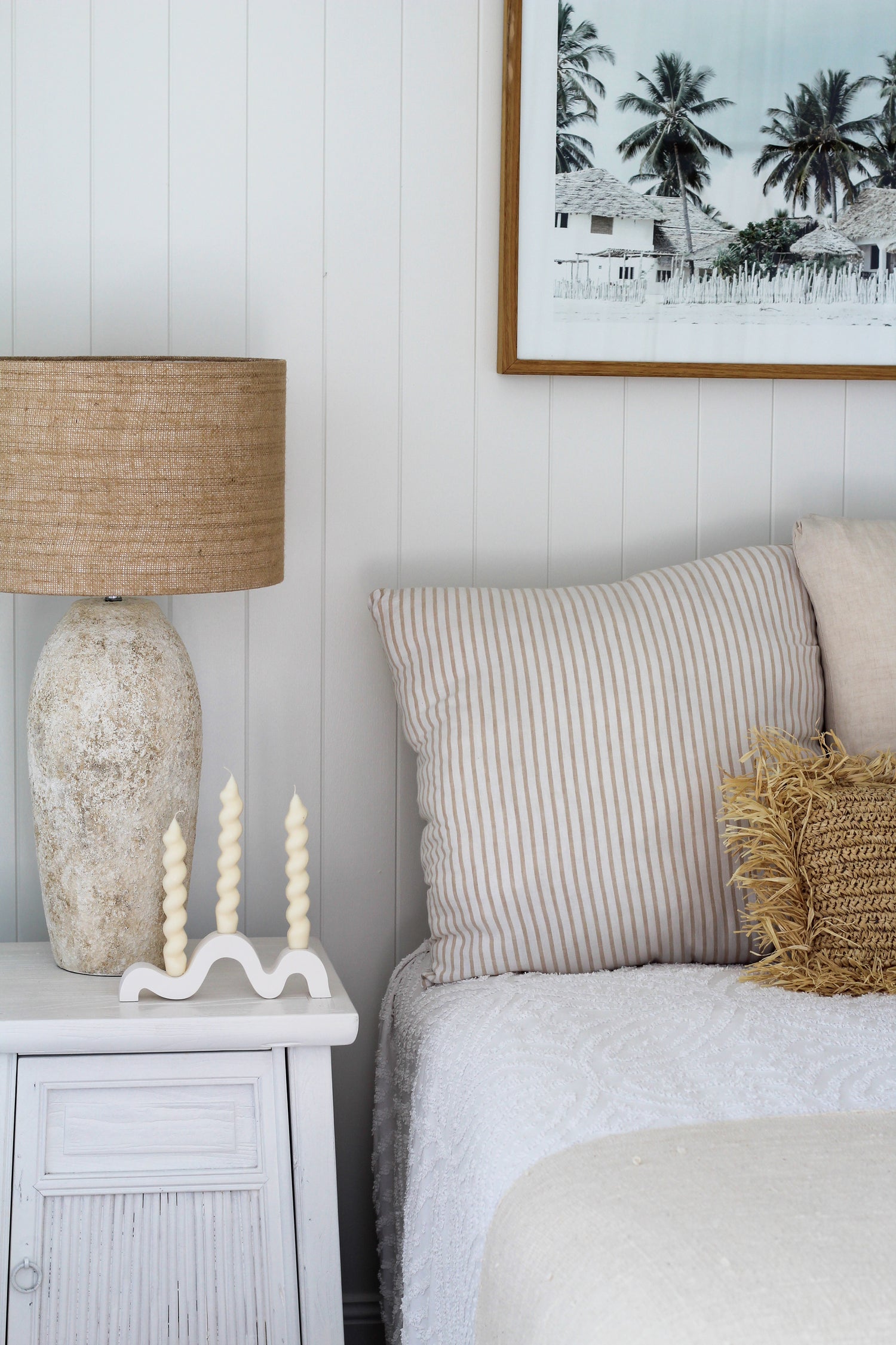 Sculptural Taper Candles styled in a modern bedroom