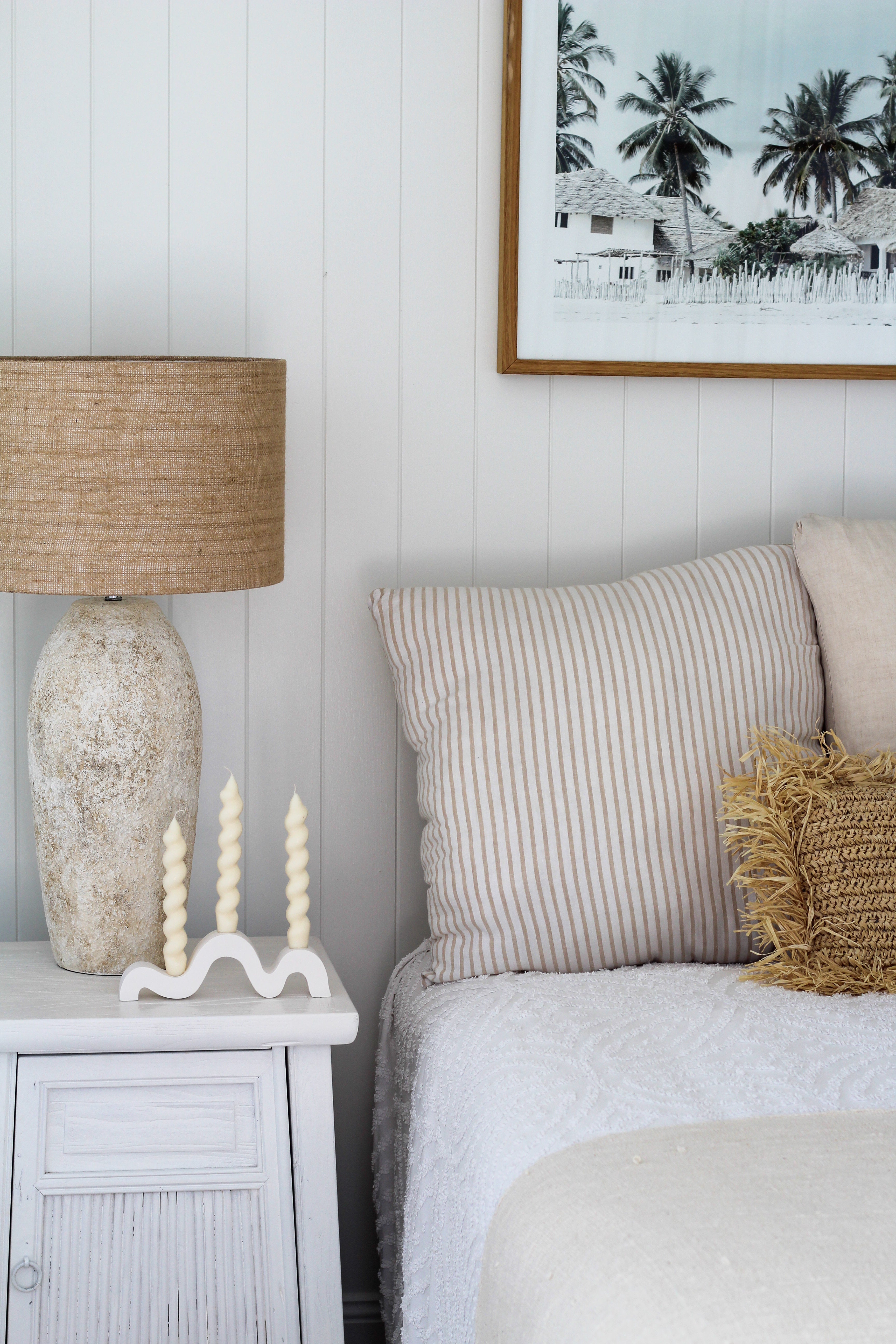 Sculptural Taper Candles styled in a modern bedroom